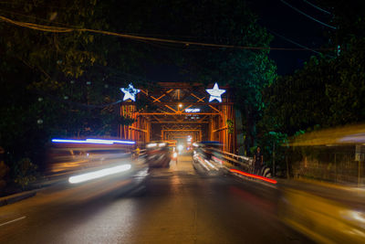 Light trails on road at night