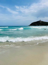 Scenic view of beach against sky