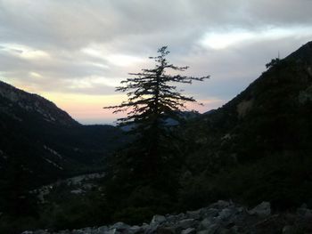 Scenic view of mountains against sky during sunset