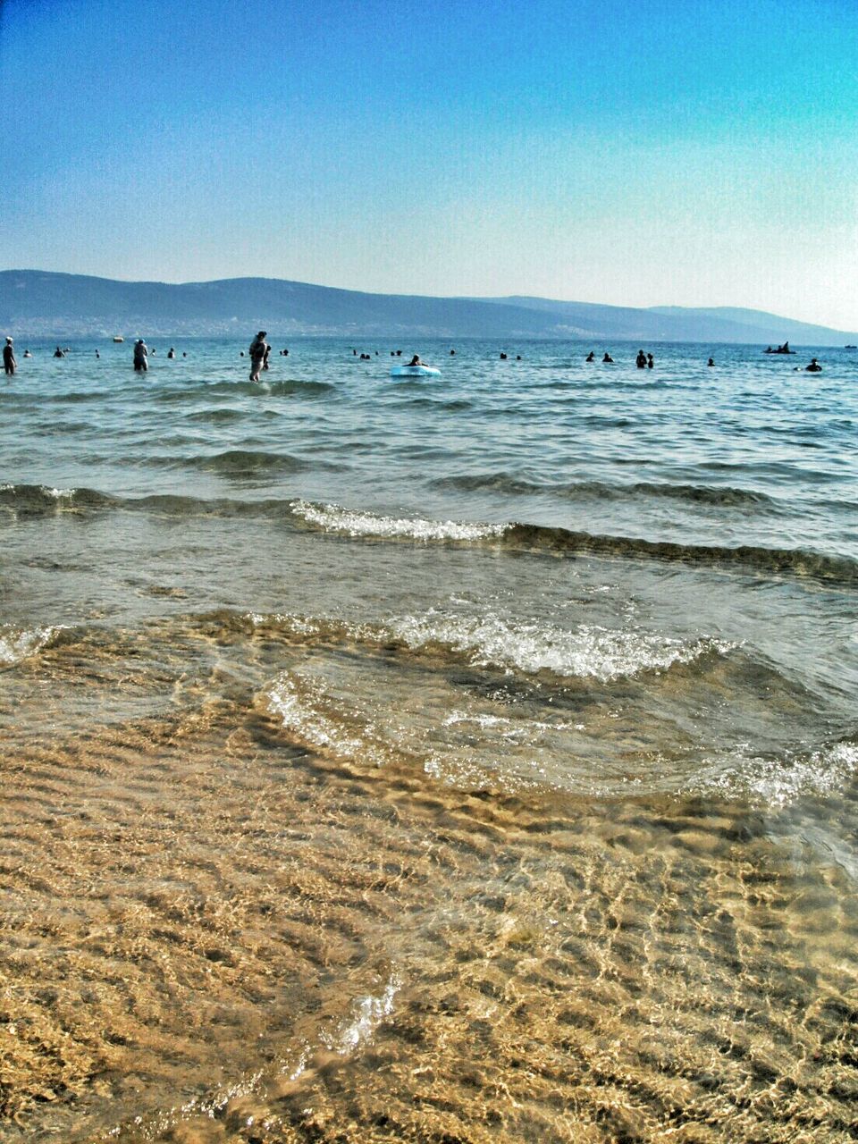 sea, beach, water, horizon over water, clear sky, sand, shore, scenics, tranquil scene, tranquility, beauty in nature, wave, copy space, blue, nature, surf, vacations, idyllic, incidental people, sky