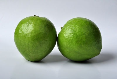 Close-up of apple against white background