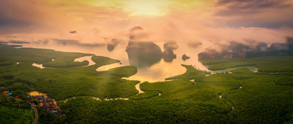 Scenic view of landscape against sky during sunset