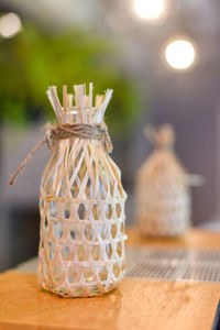 Small wicker round bamboo basket decoration on the table. portrait size