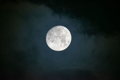 Low angle view of full moon in sky