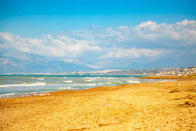 Scenic view of beach against sky