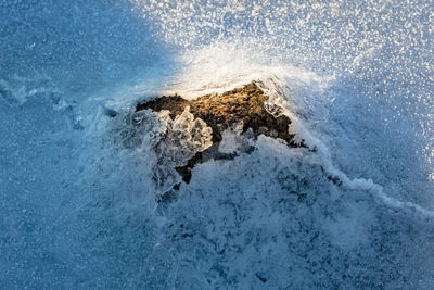 Close-up of rock on sea shore