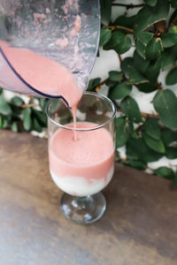 High angle view of drink in glass on table