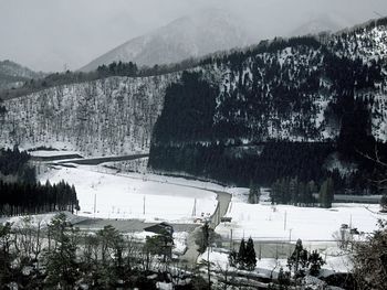 Scenic view of mountains against sky during winter