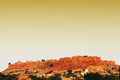 View of buildings against clear sky