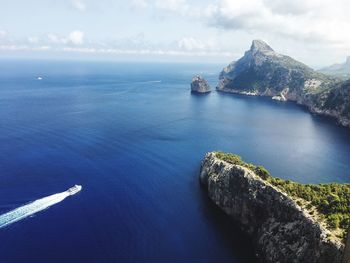 High angle view of sea against cloudy sky