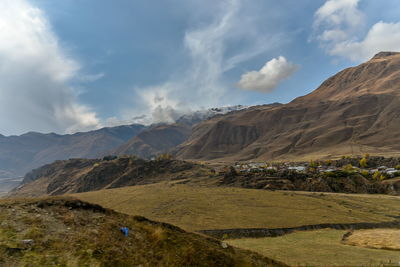 Panoramic view of landscape and mountains against sky