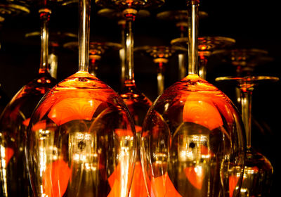 Close-up of wine glasses on bar counter