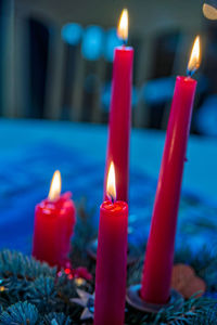 Close-up of illuminated candles