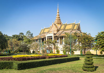 View of temple against clear blue sky