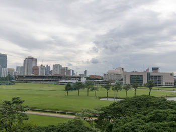 Buildings in city against sky