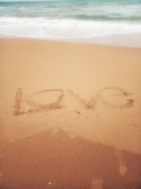 Heart shape on sand at beach