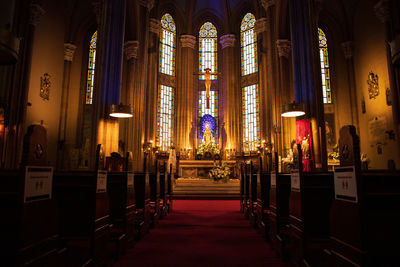 Illuminated statues in building