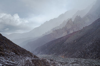 Scenic view of mountains against sky during winter