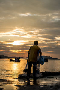 Scenic view of sea at sunset