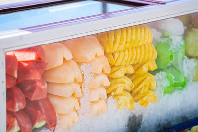 Close-up of chopped fruits for sale