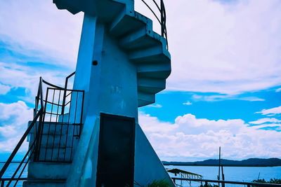 Low angle view of spiral staircase against sky