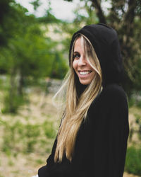 Portrait of a smiling young woman