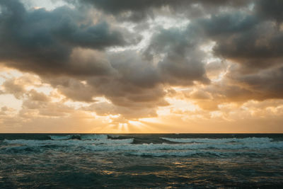 Scenic view of sea against sky during sunset