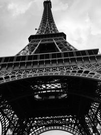 Low angle view of eiffel tower against sky