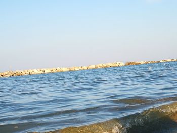 Scenic view of sea against clear sky