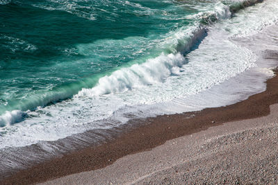 Waves rushing towards seashore