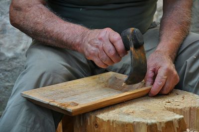 Midsection of man working