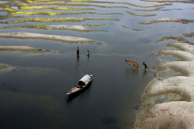 High angle view of people in sea