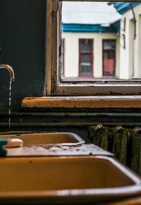 Close-up of water flowing through window