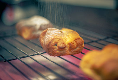 Close-up of meat on barbecue grill