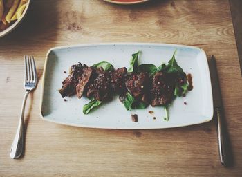 High angle view of meal served in plate on table