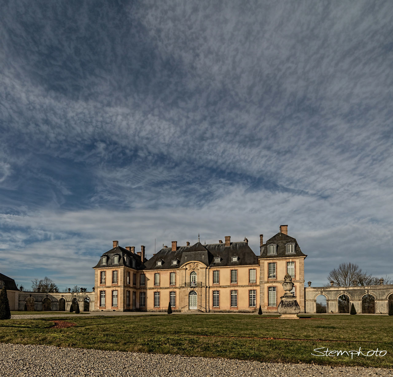 HOUSES AGAINST SKY IN BACKGROUND