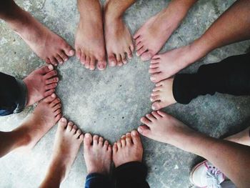 Cropped image of person holding hands