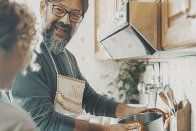 Portrait of senior man using mobile phone