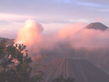 Scenic view of mountains against sky at sunset