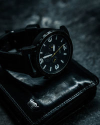 Close-up of clock on table