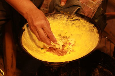 High angle view of man preparing food