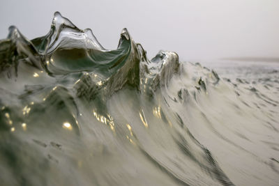 Close-up of wave splashing on shore