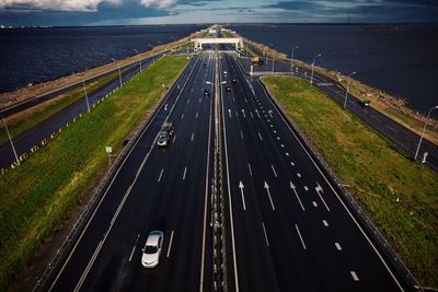 High angle view of highway road on dam after rain