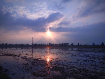 Scenic view of sunset over river