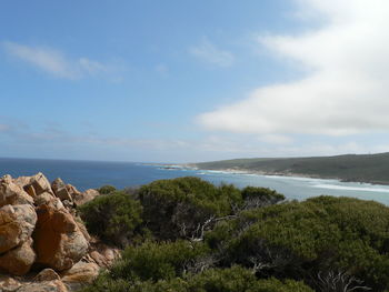 Scenic view of beach and sea against sky