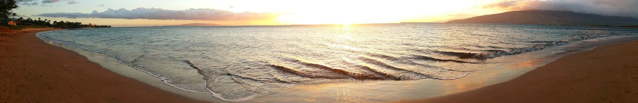 Scenic view of sea at sunset