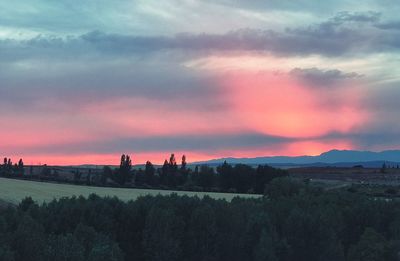 Scenic view of silhouette landscape against sky during sunset