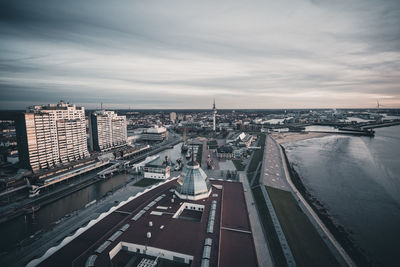 High angle view of highway by river against sky