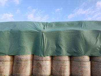 Close-up of wood against sky