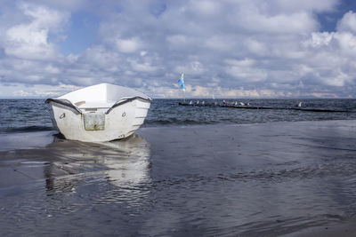 Ship in sea against sky